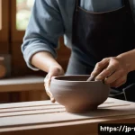 전통 공예 체험 - A serene traditional Japanese pottery workshop scene featuring a beginner artist shaping a hand-buil...