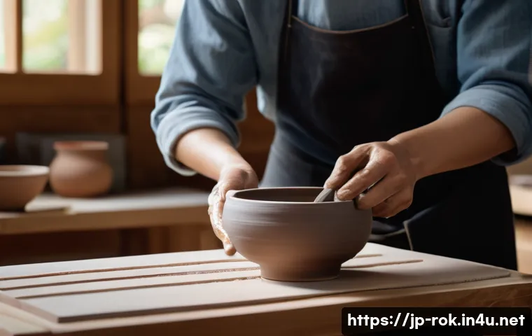 전통 공예 체험 - A serene traditional Japanese pottery workshop scene featuring a beginner artist shaping a hand-buil...